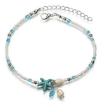 Charger l'image dans la galerie, White and blue anklet with blue starfish charm