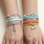Load image into Gallery viewer, Close-up of two girls wearing mermaid and unicorn friendship bracelets