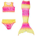 Load image into Gallery viewer, Stunning Yellow & Pink Mermaid Tail. Matching material tankini that looks great as a crop top with jean shorts. Part of our more affordable range, this tail has poppers at the bottom. The monofin can be taken on and off easily without stepping out of the whole tail. Don't forget to add a Monofin to give your tail end structure and to enable swimming. Mini Mermaid Tails