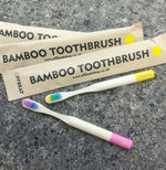 Charger l'image dans la galerie, Bamboo toothbrushes in assorted pastel colors, FFBEAT packages. BPA free, charcoal infused. Mini Mermaid Tails