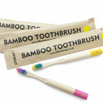 Load image into Gallery viewer, Bamboo toothbrushes in assorted pastel colors, FFBEAT packages. BPA free, charcoal infused. Mini Mermaid Tails