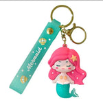 Load image into Gallery viewer, Pink mermaid keyring and turquoise Mermaid strap on white background