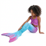 Load image into Gallery viewer, Coco seated sideways in Purple and Turquoise Frill