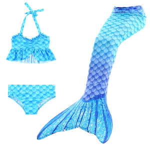 Lovely new frill top design bikini with matching tail in a gorgeous turquoise. Now available in size 100!! Age 2-3yrs - just too too cute!!  Part of our more affordable range, this tail has poppers at the bottom. The monofin can be taken on and off easily without stepping out of the whole tail. Mini Mermaid Tails