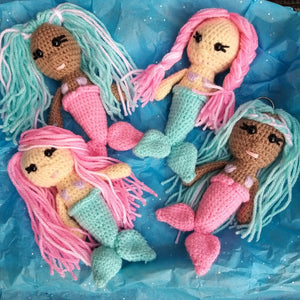 Adorable crocheted mini mermaids toy key rings  in pink and teal with hair you can style. Mini Mermaid Tails  