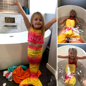 Young child wears the Yellow & Pink Mermaid Tail in the tub. Matching material tankini that looks great as a crop top with jean shorts. Part of our more affordable range, this tail has poppers at the bottom. The monofin can be taken on and off easily without stepping out of the whole tail. Mini Mermaid Tails