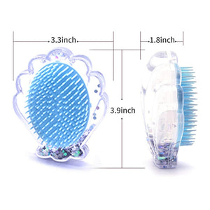 The sparkly blue glitter detangling hairbrush is 3.3 inches wide and 3.9 inches tall. Mini Mermaid Tails