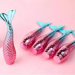 Charger l&#39;image dans la galerie, Colourful mermaid tail tube filled with sparkly purple lip gloss  Lightly pigmented this lip gloss will leave your lips feeling soft &amp; moisturized.  Vegan friendly and cruelty free but not suitable for anyone with a nut allergy. Mini Mermaid Tails
