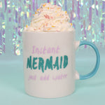 Charger l&#39;image dans la galerie, Bone china mug for adult mermaids, white with teal handle, says &quot;Instant Mermaid (in teal colored glitter) just add water&quot; with pink lettering.  Mini Mermaid Tails

