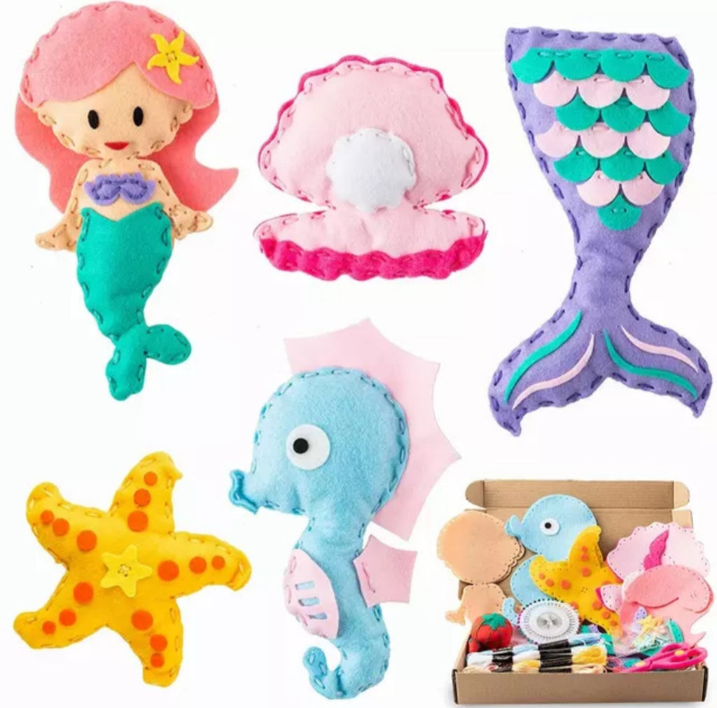 This is an adorable Felt Sewing Kit wit adorable Mermaid, Mermaid tail, Clam Shell, Seahorse,  and Starfish patterns. Mini Mermaid Tails
