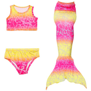 Stunning Yellow & Pink Mermaid Tail. Matching material tankini that looks great as a crop top with jean shorts.  Part of our more affordable range, this tail has poppers at the bottom. The monofin can be taken on and off easily without stepping out of the whole tail.  Don't forget to add a Monofin to give your tail end structure and to enable swimming. Mini Mermaid Tails