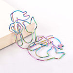 Load image into Gallery viewer, Two rainbow colored paperclips shaped as Mermaids - use as paperclips or bookmarks. Mini Mermaid Tails
