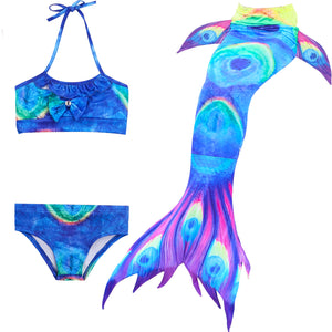 Peacock feather design Mermaid Tail with added dorsal fins. Complete with matching material halterneck bikini with cute embellished bow.  Part of our luxury range, this tail has a high quality side zip.  Mini Mermaid Tails