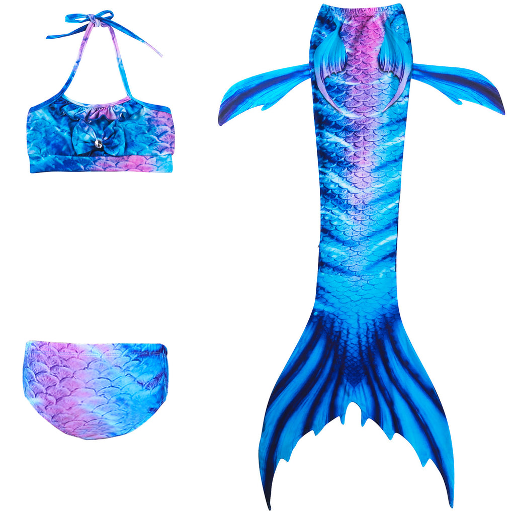 Bold Blue Tiger Mermaid Tail with just a splash of purple. Complete with dorsal fins for a true little mermaid look and matching material halterneck bikini with cute embellished bow. Mini Mermaid Tails