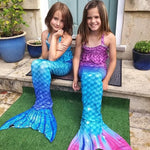 Load image into Gallery viewer, Two happy girls wearing their mermaid tails from Mini Mermaid Tails.
