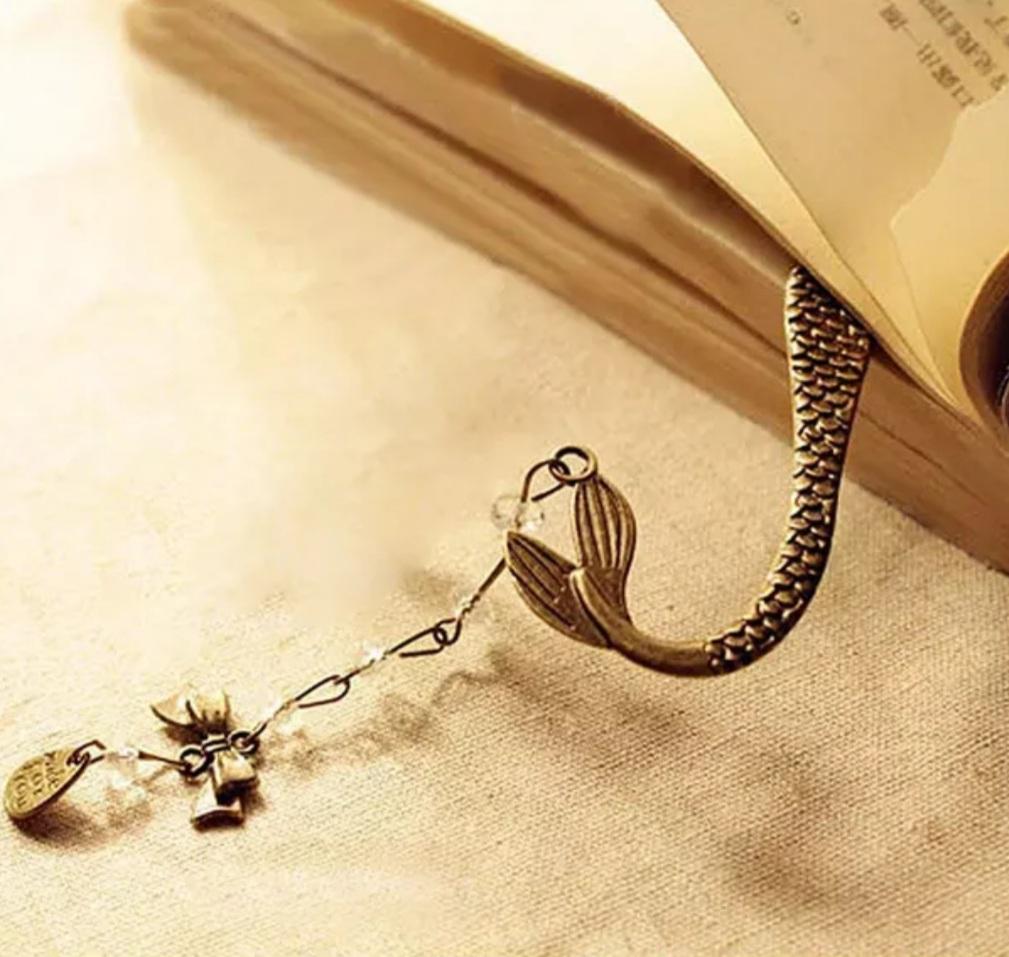Mermaid Tail bookmark with charm coming out of a book. Mini Mermaid Tails