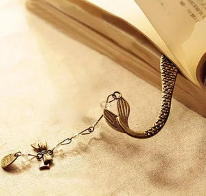 Mermaid Tail bookmark with charm coming out of a book. Mini Mermaid Tails