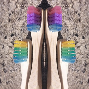 Bamboo toothbrushes in assorted pastel colors.  BPA free, charcoal infused. Mini Mermaid Tails